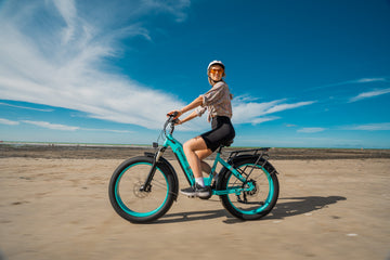 A woman riding an electric bike on the beach-0813