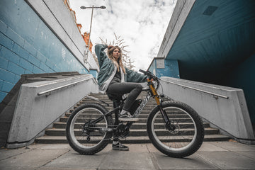 A woman rides an electric bike.-1119